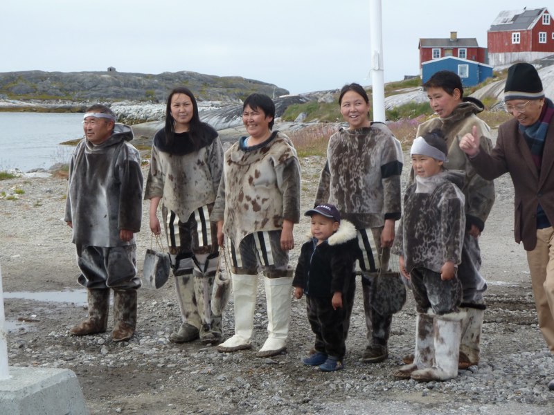 The locals showing us their seal-skin clothing